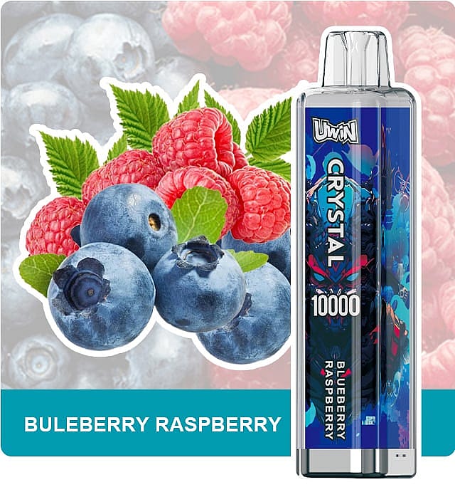 A close-up of fresh blueberries and raspberries with green leaves next to a UwU Crystal vape device labeled 'Blueberry Raspberry' with a capacity of 10000 puffs.