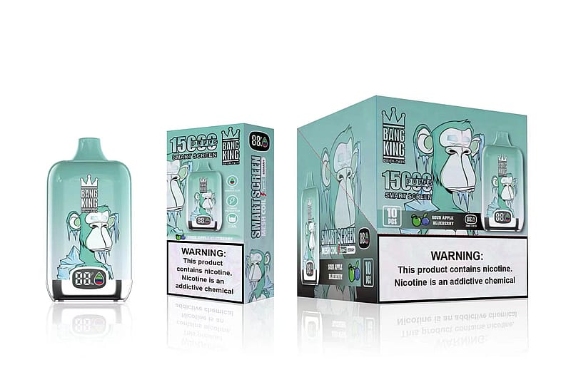 Un dispositivo de vapeo desechable de color verde con un gráfico de un mono, etiquetado como "Bang King" y "15.000 caladas", expuesto junto a su envase, que incluye advertencias sanitarias sobre la adicción a la nicotina.