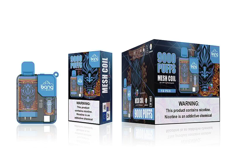 Bang Box Einweg-Dampfgerät mit 9000 Zügen und Mesh-Spule, mit blauer und oranger Drachen-Verpackung, einem Etikett mit der Geschmacksrichtung "Blue Razz Ice" und einer Nikotinwarnung.