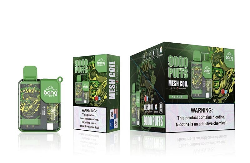 A green "Bang Box" vape device with 9000 puffs, mesh coil, and Lush Ice flavor, displayed next to its packaging featuring a bull graphic and nicotine warning.
