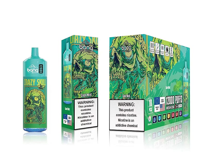 Embalaje de un producto de vapeo etiquetado "Bang Box Crazy Skull Cool Mint", con un gráfico de una calavera verde y amarilla y advertencias sobre el contenido de nicotina.