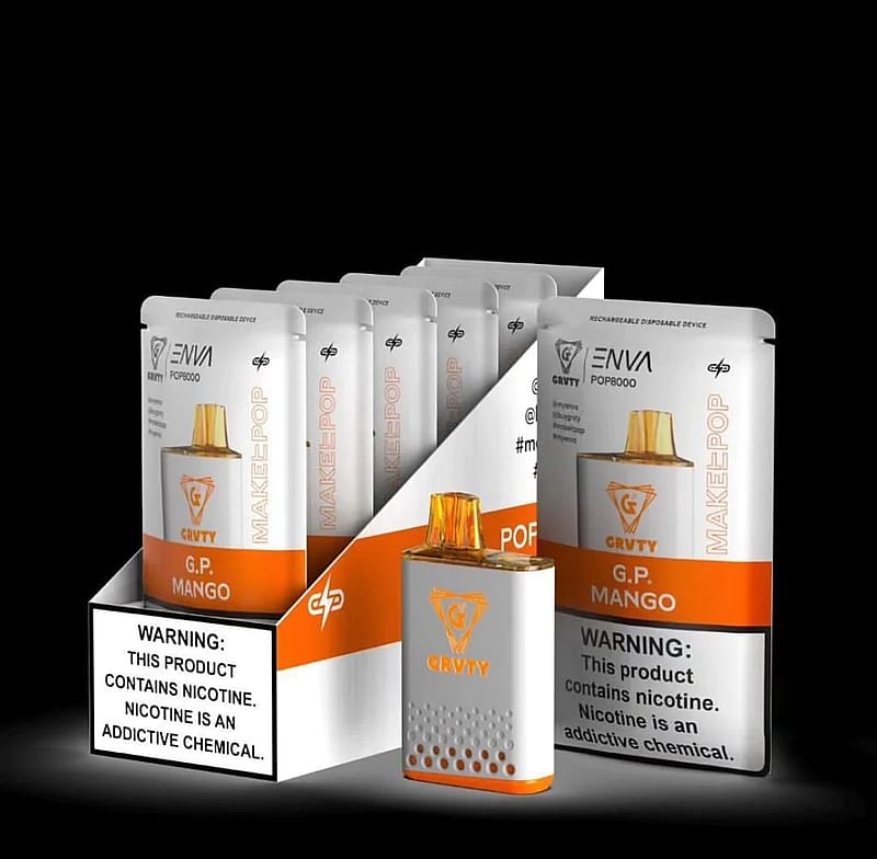 A display of ENVI GRVTY POP8000 rechargeable disposable vape devices in G.P. Mango flavor with visible nicotine warning labels.