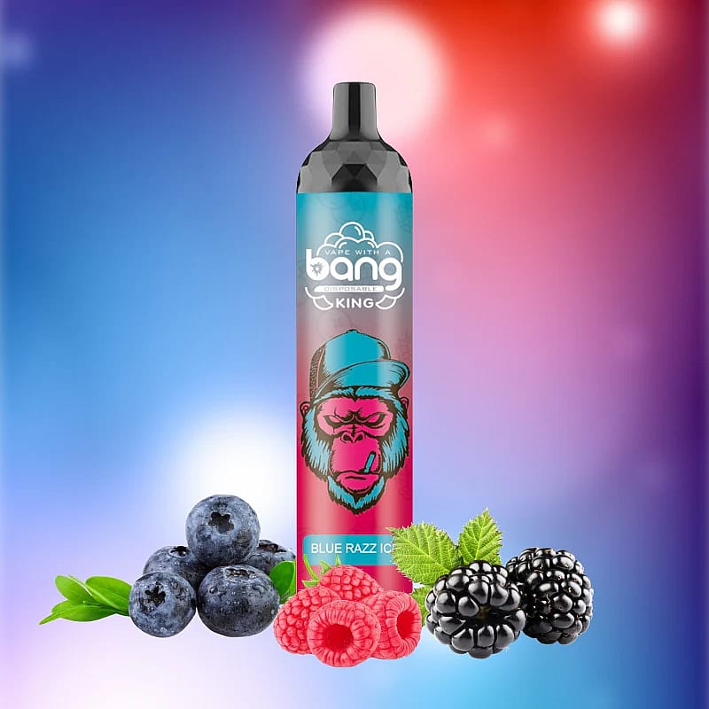 A vape device branded "Bang King" with a gorilla graphic, labeled "Blue Razz Ice," surrounded by blueberries, raspberries, and blackberries on a colorful gradient background.