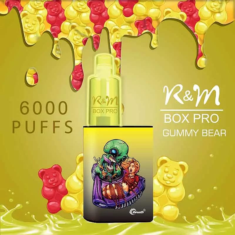 Dispositivo per svapare R&M Box Pro con 6000 boccate, gusto orsetto gommoso, caratterizzato da un colorato motivo a cartone animato sulla parte anteriore.
