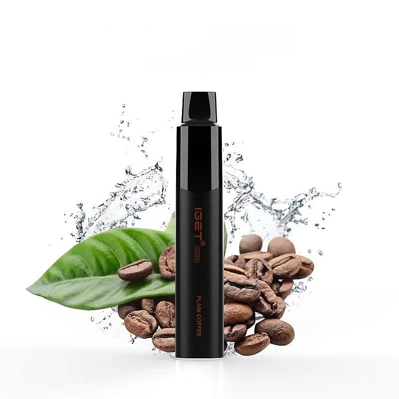 Black vaping device labeled "IGET" with "Plain Coffee" flavor, displayed in front of coffee beans, a green leaf, and splashing water.