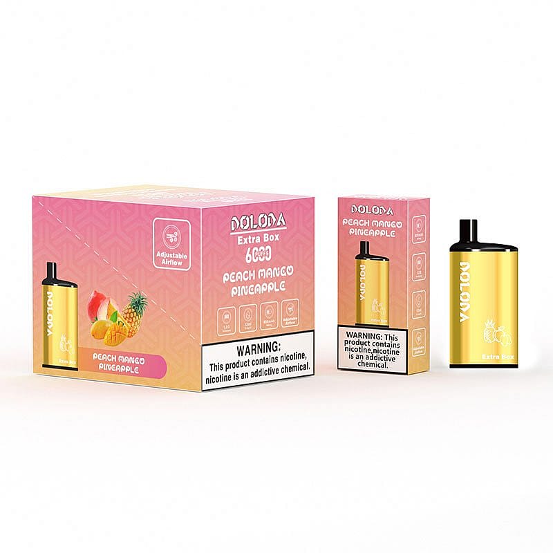 Emballage de la boîte Doloda Extra au goût Pêche Mangue Ananas, comportant un appareil à vapotage et une étiquette d'avertissement sur la teneur en nicotine.