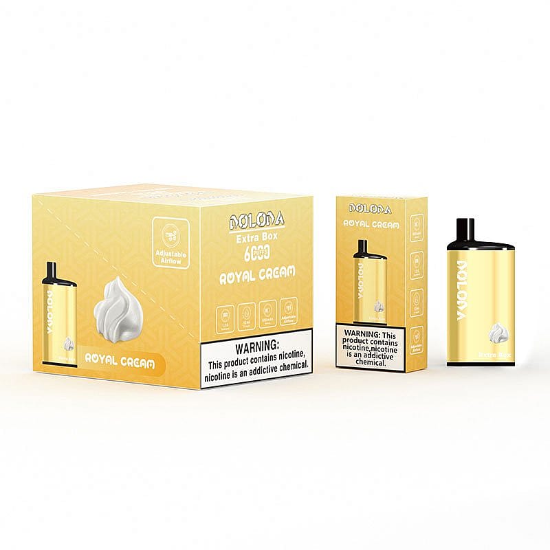 Emballage et produit d'une vape aromatisée jaune et or étiquetée « ROYAL CREAM » avec des étiquettes d'avertissement de nicotine.