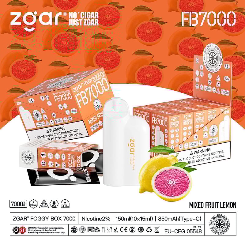Zgar Foggy Box 7000 mixed fruit lemon vape packaging with a white vape device, showing product details, warning labels, and a citrus fruit graphic.