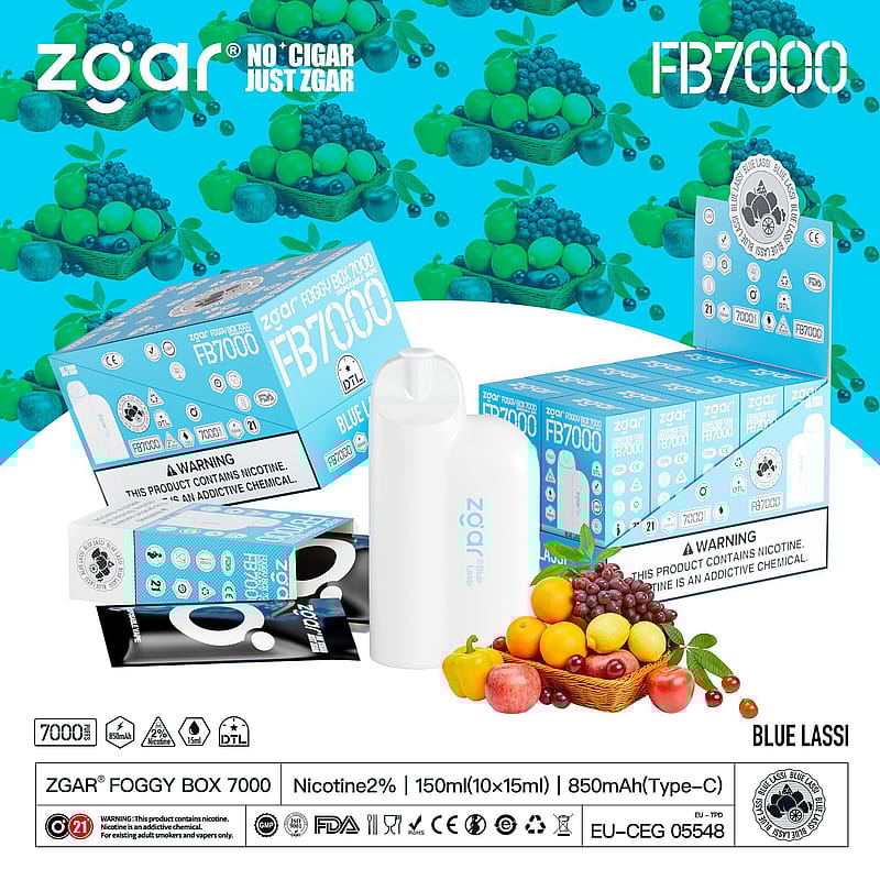 ZGAR Foggy Box 7000 vape with Blue Lassi flavor packaging and vape device, surrounded by a pattern of blue and green fruit illustrations.