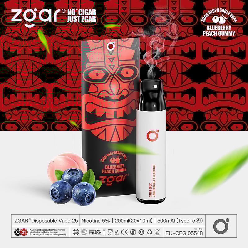 Confezione di ZGAR monouso al gusto Blueberry Peach Gummy con grafica tribale in grassetto, illustrazioni di gommose al mirtillo e alla pesca e informazioni sul prodotto, tra cui il contenuto di nicotina e l'etichetta di avvertenza.