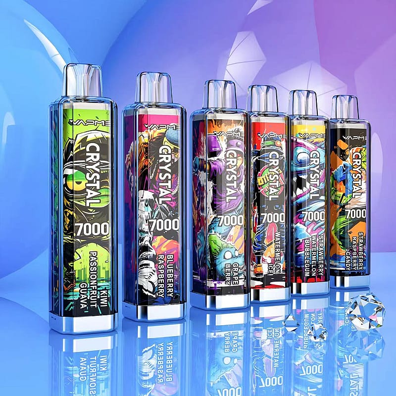 A lineup of colorful disposable vape devices labeled "CRYSTAL 7000" in various fruit flavors, displayed on a reflective surface with a blue and purple background.