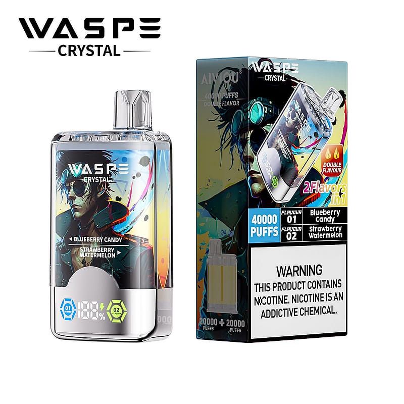 Un appareil de vapotage WASP Crystal et son emballage, proposant deux saveurs : Bonbon aux myrtilles et Pastèque aux fraises avec une déclaration de 40 000 bouffées, ainsi qu'une étiquette d'avertissement sur la nicotine.