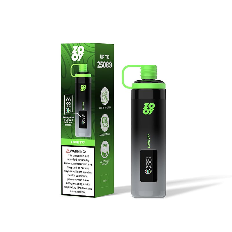 A sleek black and green vaping device next to its branded packaging displaying product features and a health warning.