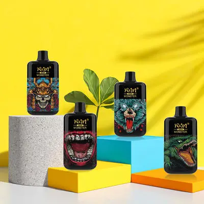 Four black vape devices with monster-themed designs are displayed on colorful geometric blocks against a bright yellow background.