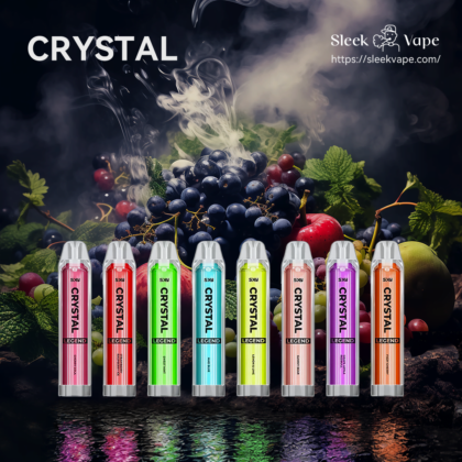 "Colorful vape devices labeled 'CRYSTAL' in front of a background of fruits and mist."