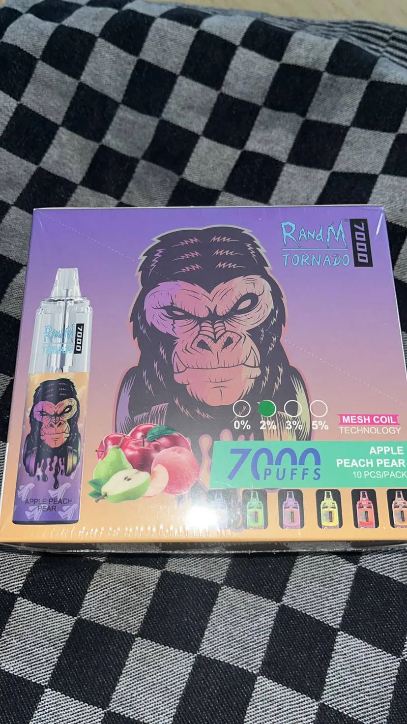 Packaging of a RandM Tornado 7000 disposable vape featuring an illustration of an ape, labeled with "Apple Peach Pear" flavor and "7000 puffs."