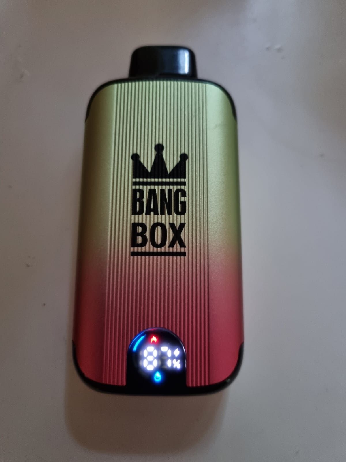 A Bang Box vape device displaying a digital screen with an 87% battery indicator.