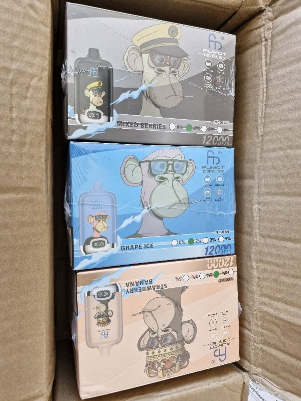 Three boxes of vape products featuring cartoonish monkey characters, each representing a different flavor: Mixed Berries, Grape Ice, and Strawberry Banana.